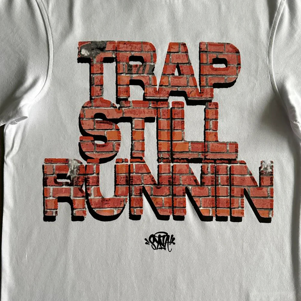 SYNA TRAP STILL RUNNIN TEE